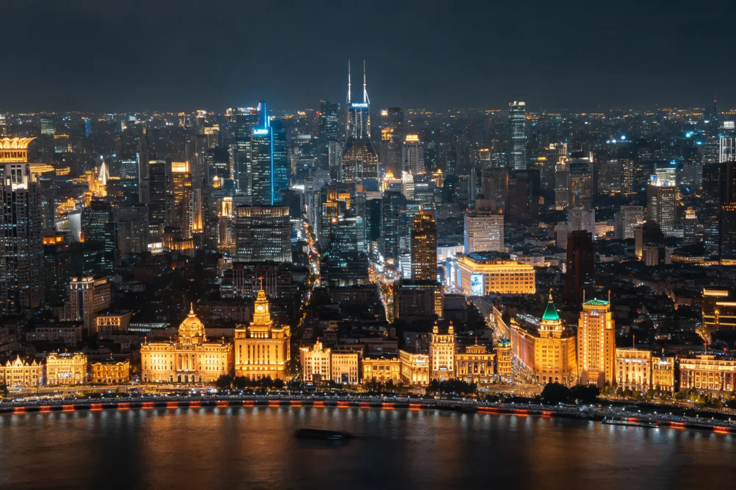 Shanghai night skyline luxury experience featuring the Bund waterfront, Lujiazui skyscrapers, and Huangpu River evening cruise with stunning city lights – Origin China Travel