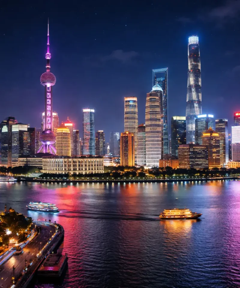 Shanghai night skyline over Huangpu River with Oriental Pearl Tower illuminated cityscape luxury China travel experience by Origin China Travel
